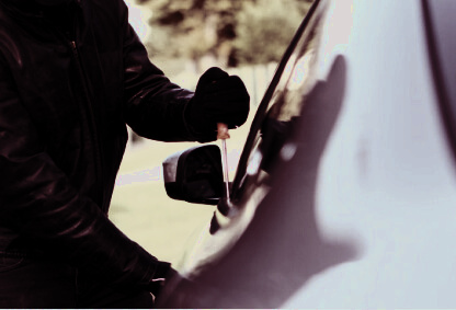 A figure at a car window