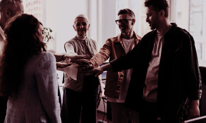 Customers being handed the keys to a vehicle